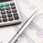 Items for business on a light background on the table, view from