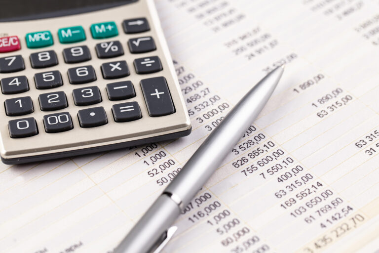 Items for business on a light background on the table, view from