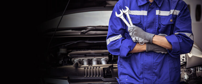 Car care maintenance and servicing, Close up hand technician auto mechanic holding the wrench for repairing change spare part car engine problem and insurance service support.